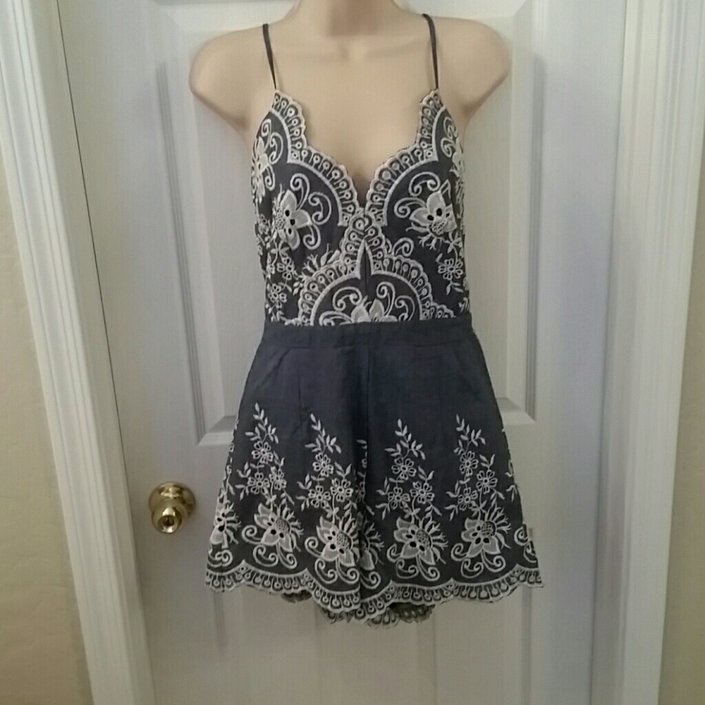 Romper: Jean color with white embellishments
